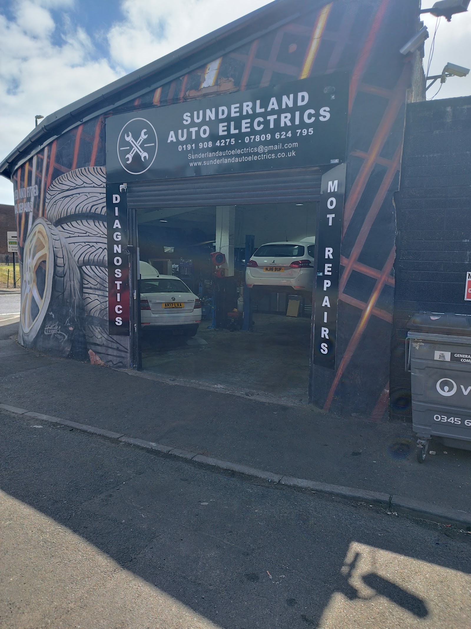 Sunderland Auto Electrics — the hand-painted workshop on Thompson Road, cars in the diagnostics bay
